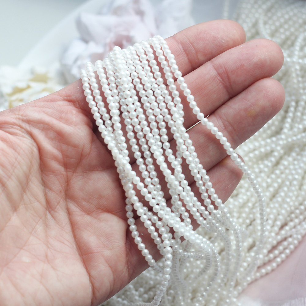 м2-б Майорка шар гладкий 2мм белый, нить 40см