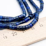 Лазурит бусины (тонирован), размер около 4*2 мм, цена за 37-38 шт (1/4 нити)