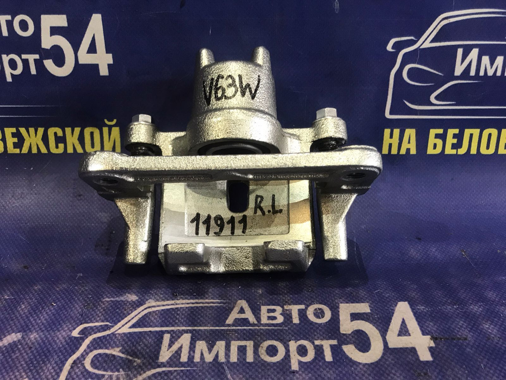 Суппорт тормозной задний левый MITSUBISHI PAJERO 1999-2002