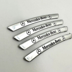 Наклейки Мерседес черные объемные пластик (шильдик Mercedes, 9х0,8см). Черные с серебристой надписью и лого - 4шт в комплекте