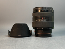 Sony F2.8 16-50 SSM, внутри линзы точки, похоже на налет