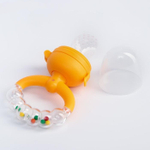 4780631 Ниблер с силикон. сеточкой, ручка-погремушка, вр. поршень, цвет оранжевый