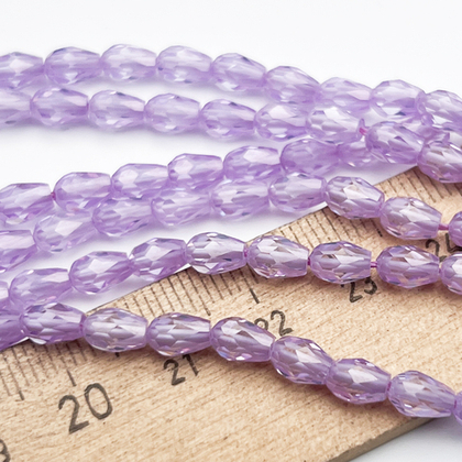 Фианит Капля бусины (кубический цирконий), цвет сиреневый, размер около 6,3*4,3 мм, цена за набор 14 шт (1/4 нити)