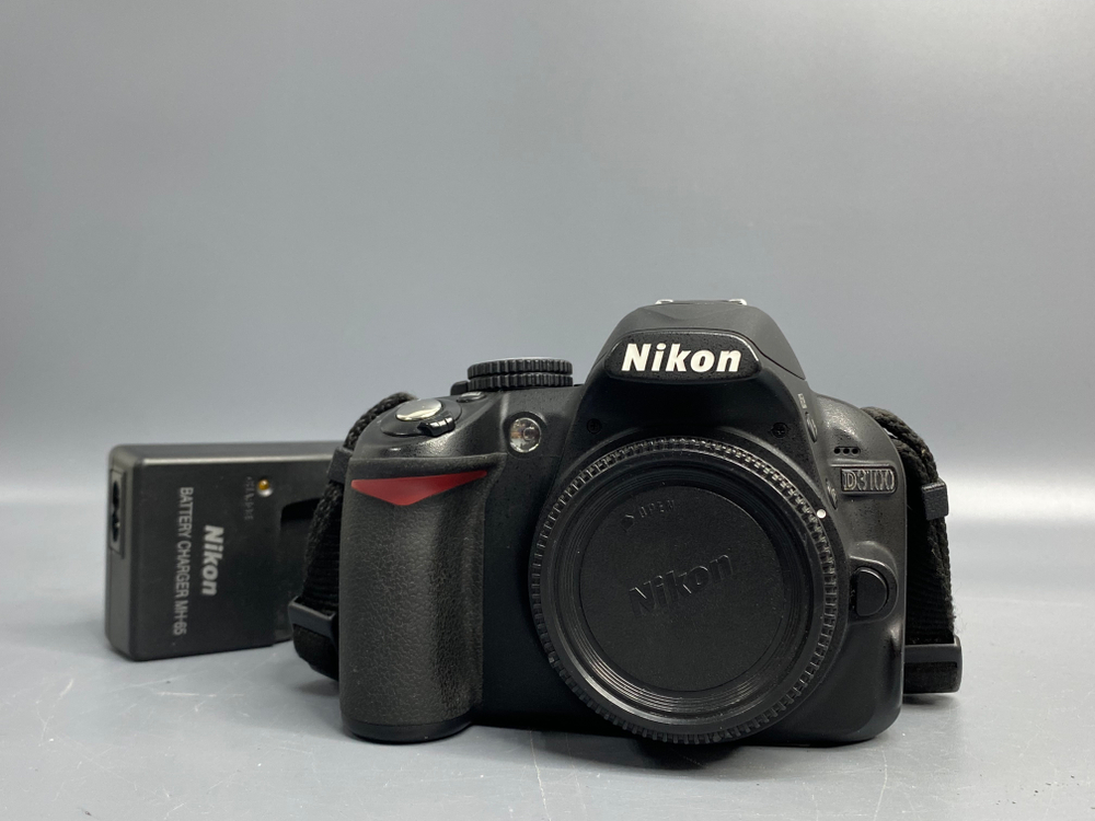 Nikon D3100 3.936 кадров