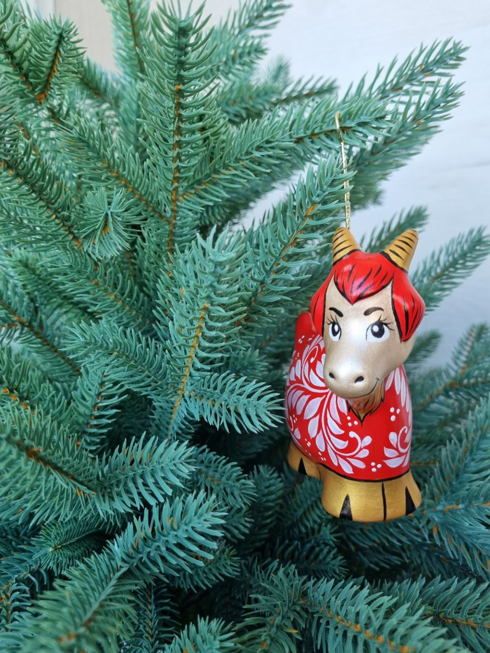 Фарфоровая игрушка огненная коза