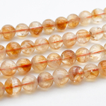 "Цитрин" бусины (кварц), диаметр около 7,5-7,8 мм, цена за 12 шт (1/4 нити)