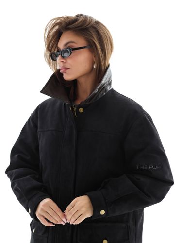 Черный пуховик из эко-замши с мехом песца и кожаным воротником