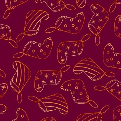 Золотистые рождественские носки на винном фоне