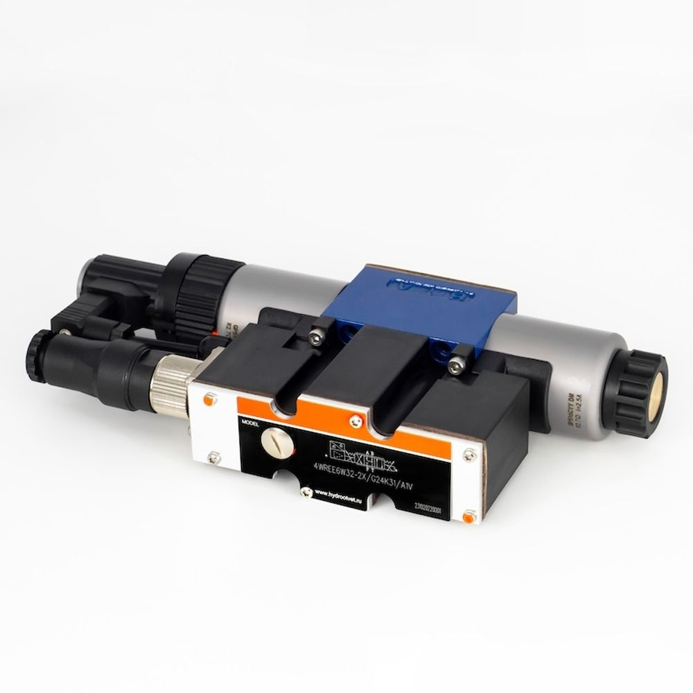 4WREE6W32-2X/G24K31/A1V - Пропорциональный распределитель с обратной связью по положению золотника со встроенным усилителем Ду6, A1 = ±10 В, номинальный расход 32 л/мин, схема W