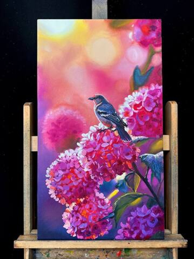 Птица на цветущей ветке