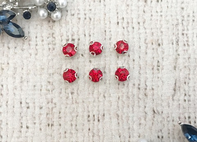 Стразы пришивные стекло в оправе, d 0,5 см.