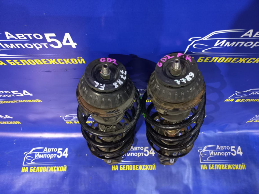 Стойка передняя правая Honda FIT 2001-2007