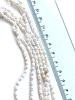 ж711 Жемчуг натуральный "рис длинный" 7*11мм, 36см