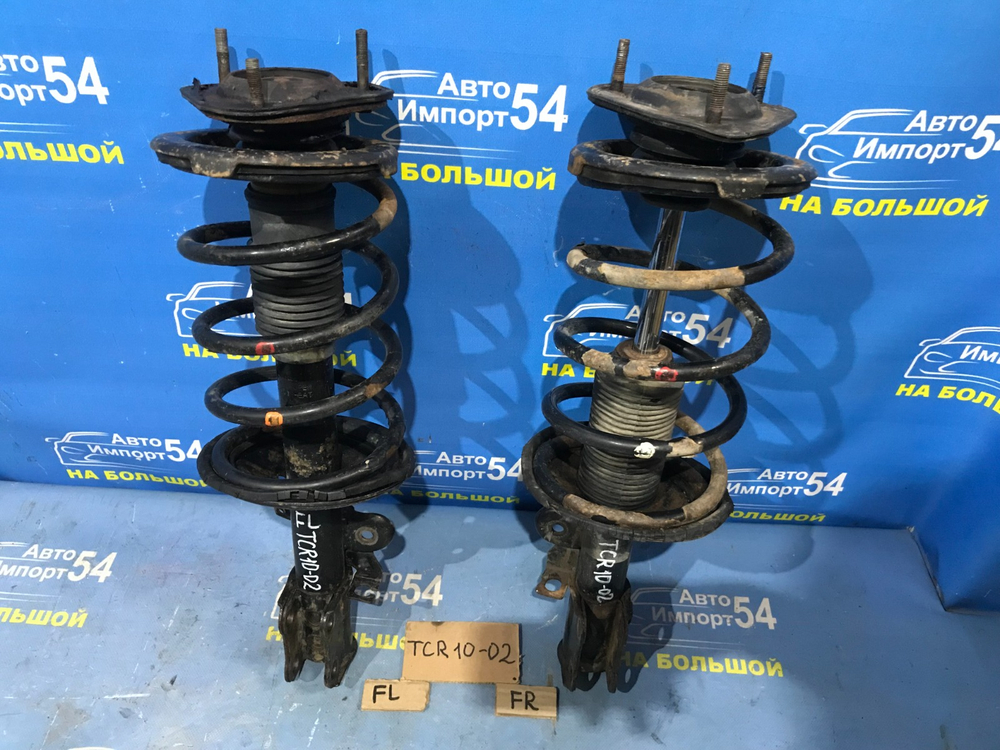 Стойка передняя правая TOYOTA ESTIMA 1999