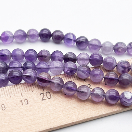 Аметист бусины, диаметр около 6,5-6,7 мм, цена за 29-30 шт (1/2 нити)