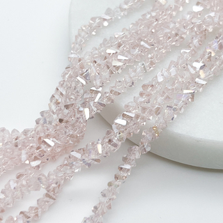 Бусина Треугольник, стекло, цвет розовый АВ, размер около 3*4 мм, цена за нить 34 см