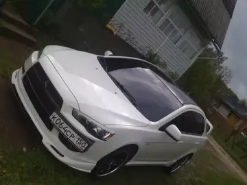 Юбка переднего бампера Zodiak для Mitsubishi Lancer 10