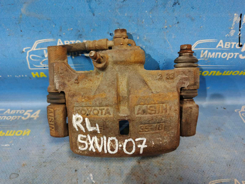 Суппорт тормозной задний левый TOYOTA CAMRY 1996