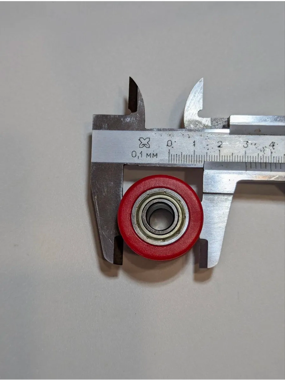 Ролик натяжителя привода цепи