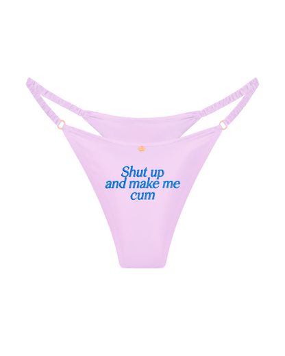 трусы стринги шелковые с надписью Shut up and make me cum сиреневые