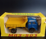Модель автомобиля "МАЗ - 503" самосвал. В оригинальной коробке, в масштабе 1:43, металл, пластик СССР
