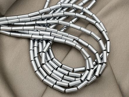 Нить гематитовых бусин "Трубочки" 3х9мм