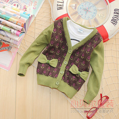 Кардиган детский жаккардовой вязки с декоративными бантами