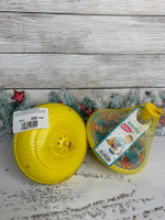 106254/Юла прозрачная "Elefantino"Домашние животные" цвет: желтый пластик, в сетке 14,5*15,5/12