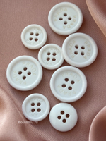 Пуговицы Прад. белые на прокол