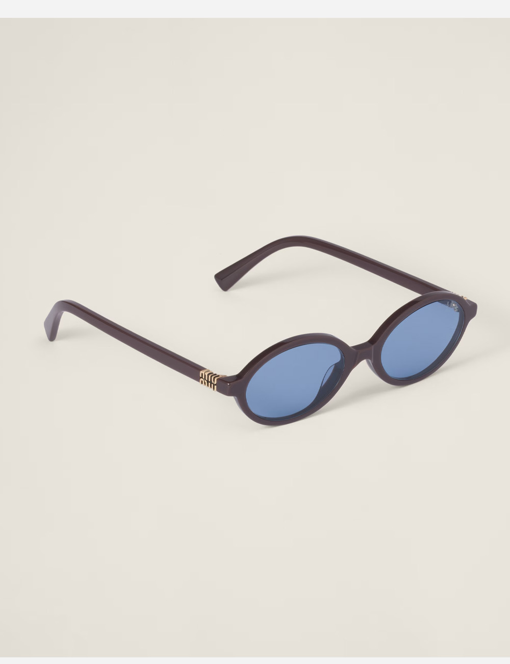 Солнцезащитные очки Miu Miu Regard Indigo lenses