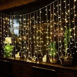 ULD-C2030-240-TWK WARM WHITE IP67 Занавес светодиодный с эффектом мерцания. 3х2м. Соединяемый. 240 светодиодов. Теплый белый свет. Провод белый. TM Uniel.