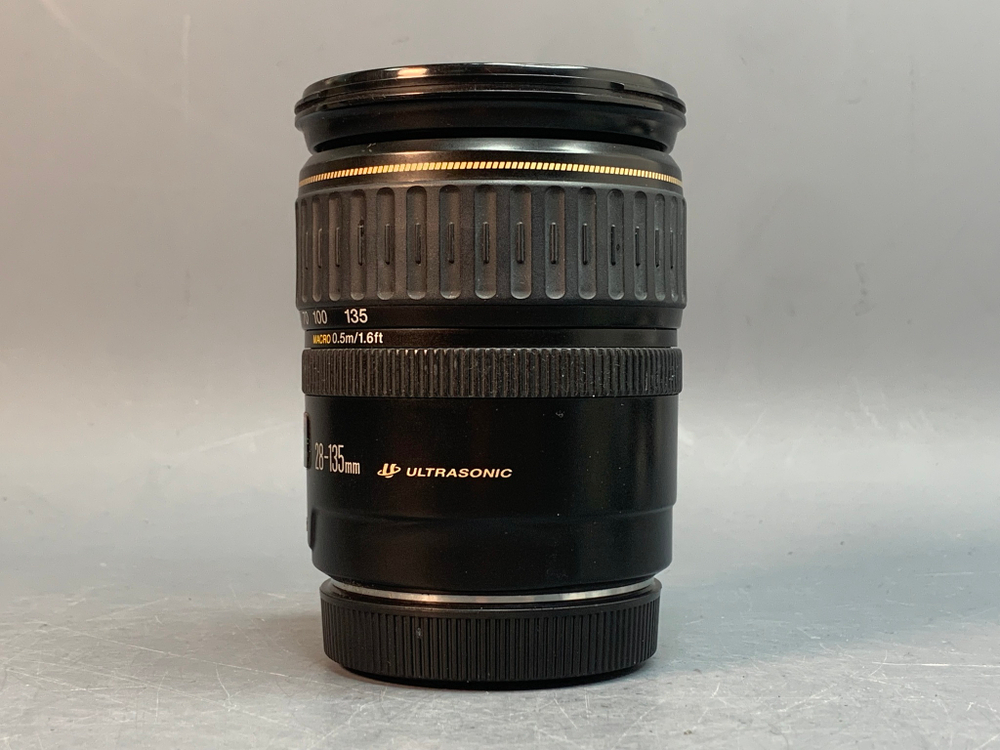 Canon 28-135mm 3.5-5.6 IS внутри пыль