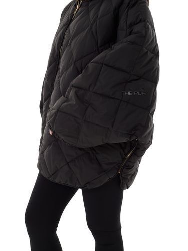 Черный пуховик-летучая мышь с вязаным капюшоном