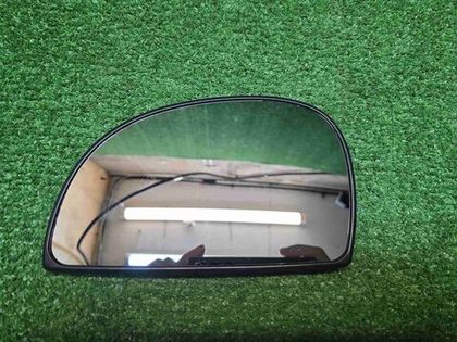 Зеркальный элемент левый Hyundai Accent (99-12)