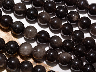 Нить бусин из обсидиана 10,5мм