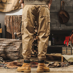 Брюки для мужчин свободные с накладными карманами и резинками внизу брючины от бренда JIELEINUO