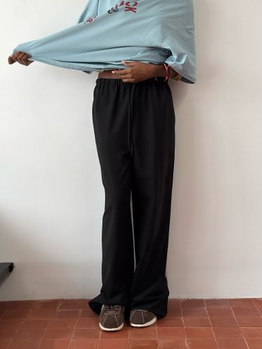Прямые широкие черные брюки на кулиске