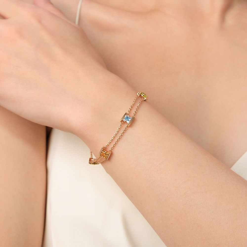 Браслет из красного золота с миксом камней