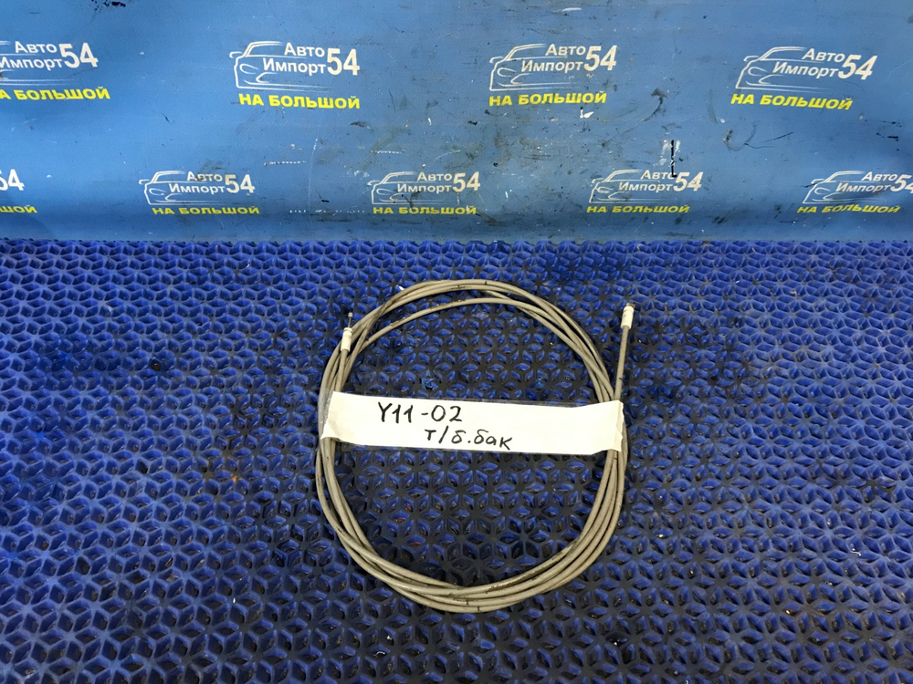 Трос лючка бензобака NISSAN AD 1999