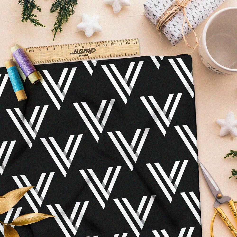 Ткань оксфорд 210 белый треугольный узор на чёрном фоне