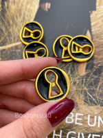 Пуговицы Скиапар. золотистые с черной эмалью "Замочная скважина"