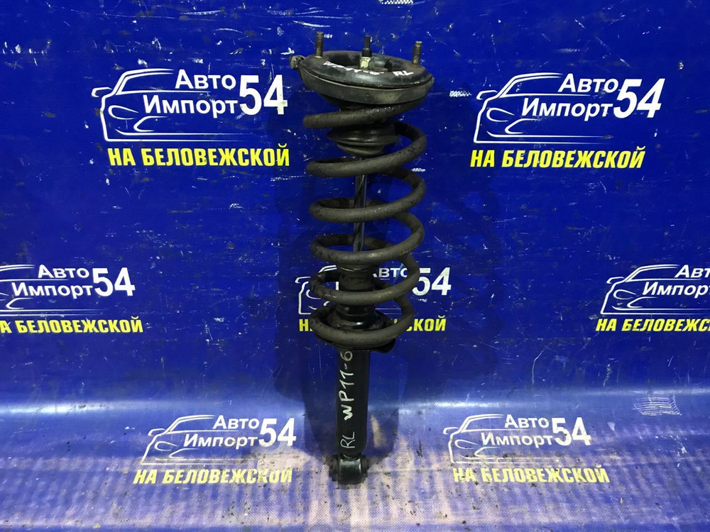 Стойка передняя левая NISSAN PRIMERA 1997