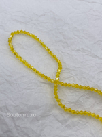Бусины стеклянные биконусы на нити желтые