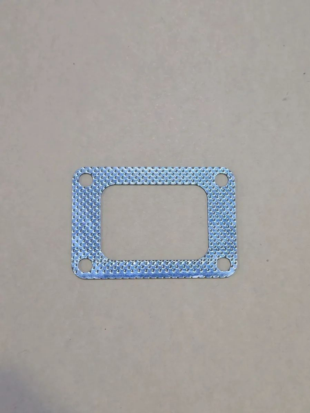 Прокладка корпуса турбокомпрессора (перфометалл)