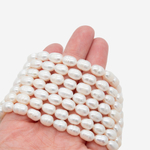 Жемчуг культивированный овальный с бороздками, белый, 6*9мм