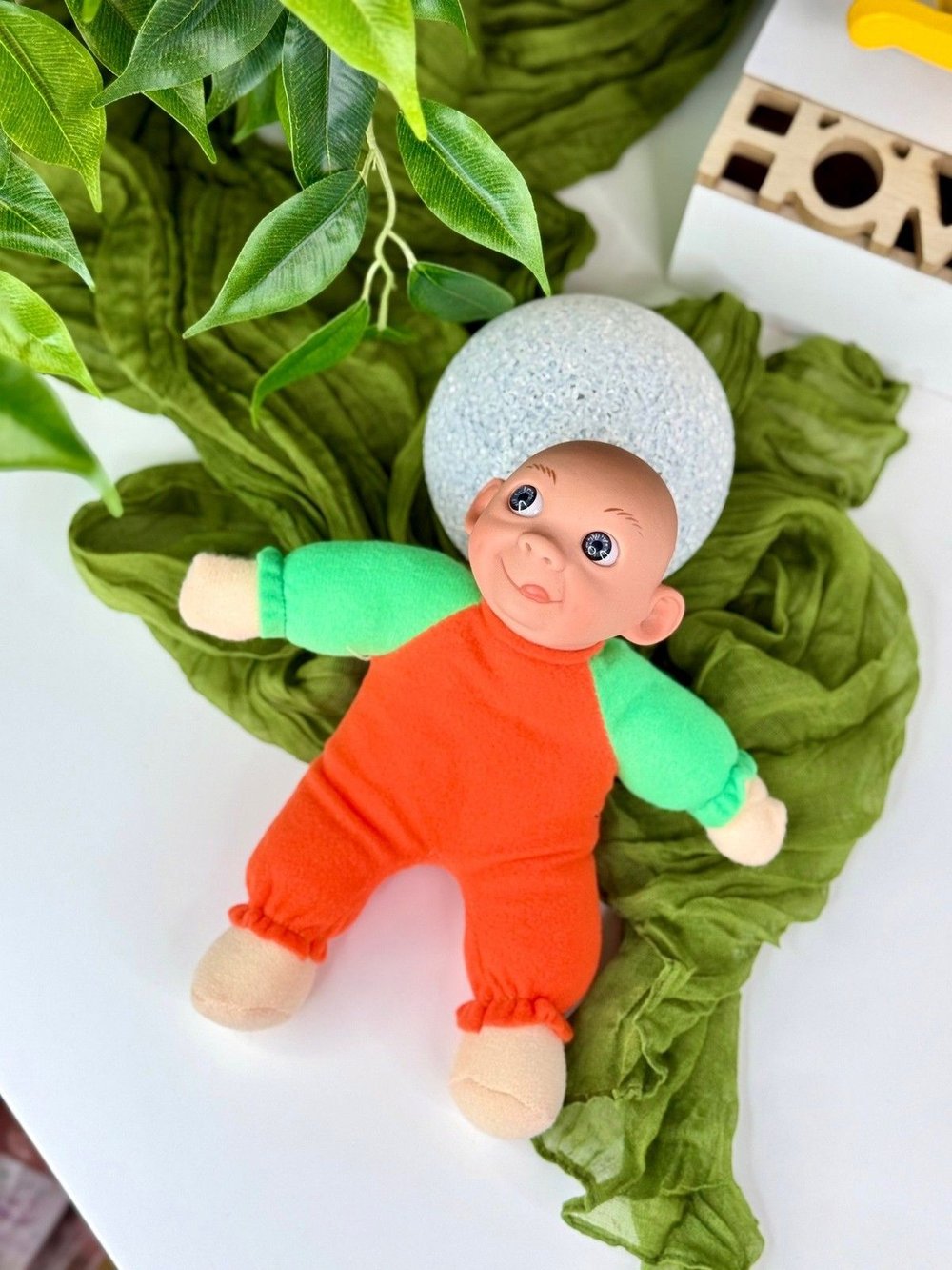 Кукла LAMAGIK мягконабивная 23см Caritas (304U2)