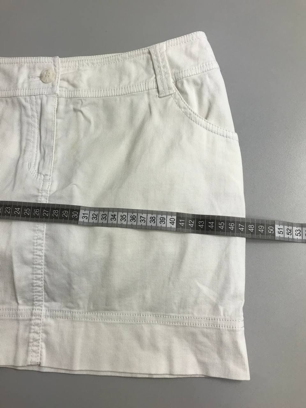 Юбка Ostin белоснежного цвета 44 размер