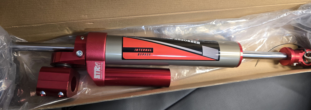 Nissan Patrol Y61 Демпфер рулевой STR