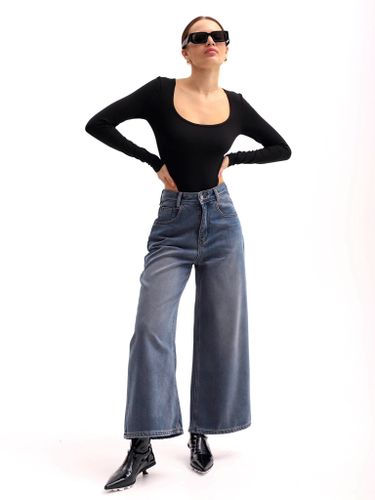 Широкие джинсы женские утепленные