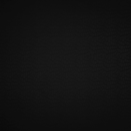 Костюмная ткань из шерсти с эластаном с леопардовыми пятнами в чёрном цвете